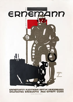 Knight in armor with camera in foreground; beige, black, red