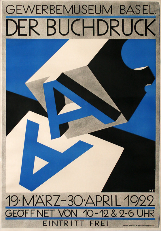 Printing block with a blue letter A lifting off a freshly printed copy; blue, black, white