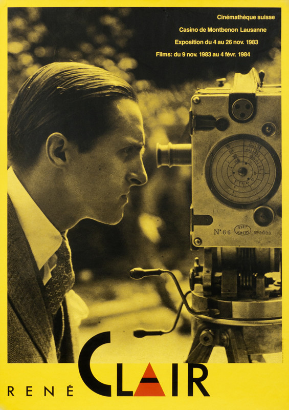 Rene Claire looks through camera viewfinder; yellow, black