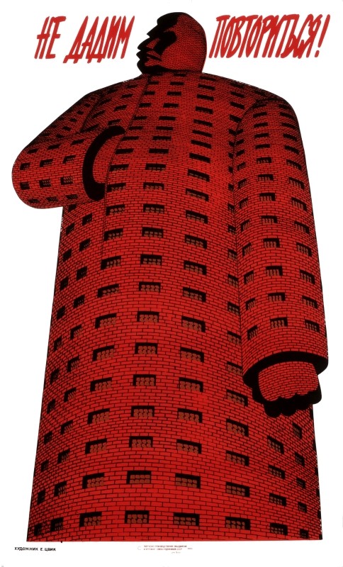 Tall brick prison with windows in a form of Stalin; red, white, black