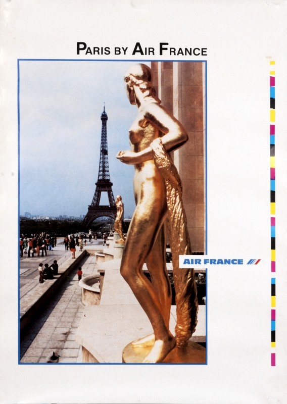 gilded female statue in foreground, eiffel tower in the back; yellow, blue, grey